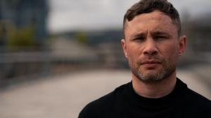 Head and shoulders colour photo of Carl Frampton, former champion boxer from Northern Ireland