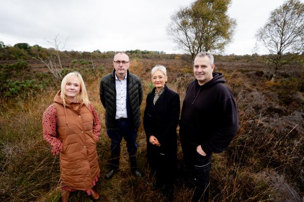 At Crossdernott Bog is Probation Service Officer Shauna Scroggie, Keith Buchanan MLA, Chief Executive Amanda Stewart, and Community Service Supervisor Michael McFall.
